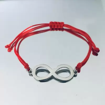 Pulseira com símbolo do infinito em aço com cordão na cor à sua escolha 