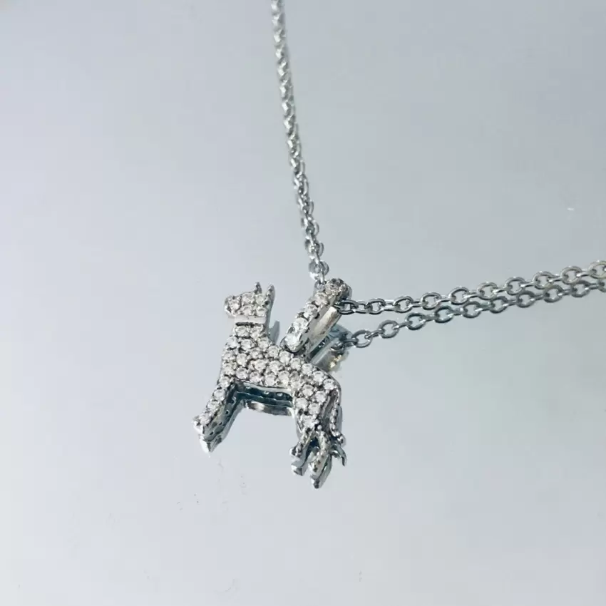 Pendentif chien en argent et zircon cubique  